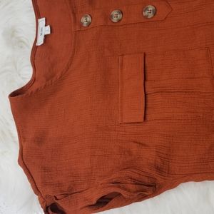 Large sized top in the color brown by Mine